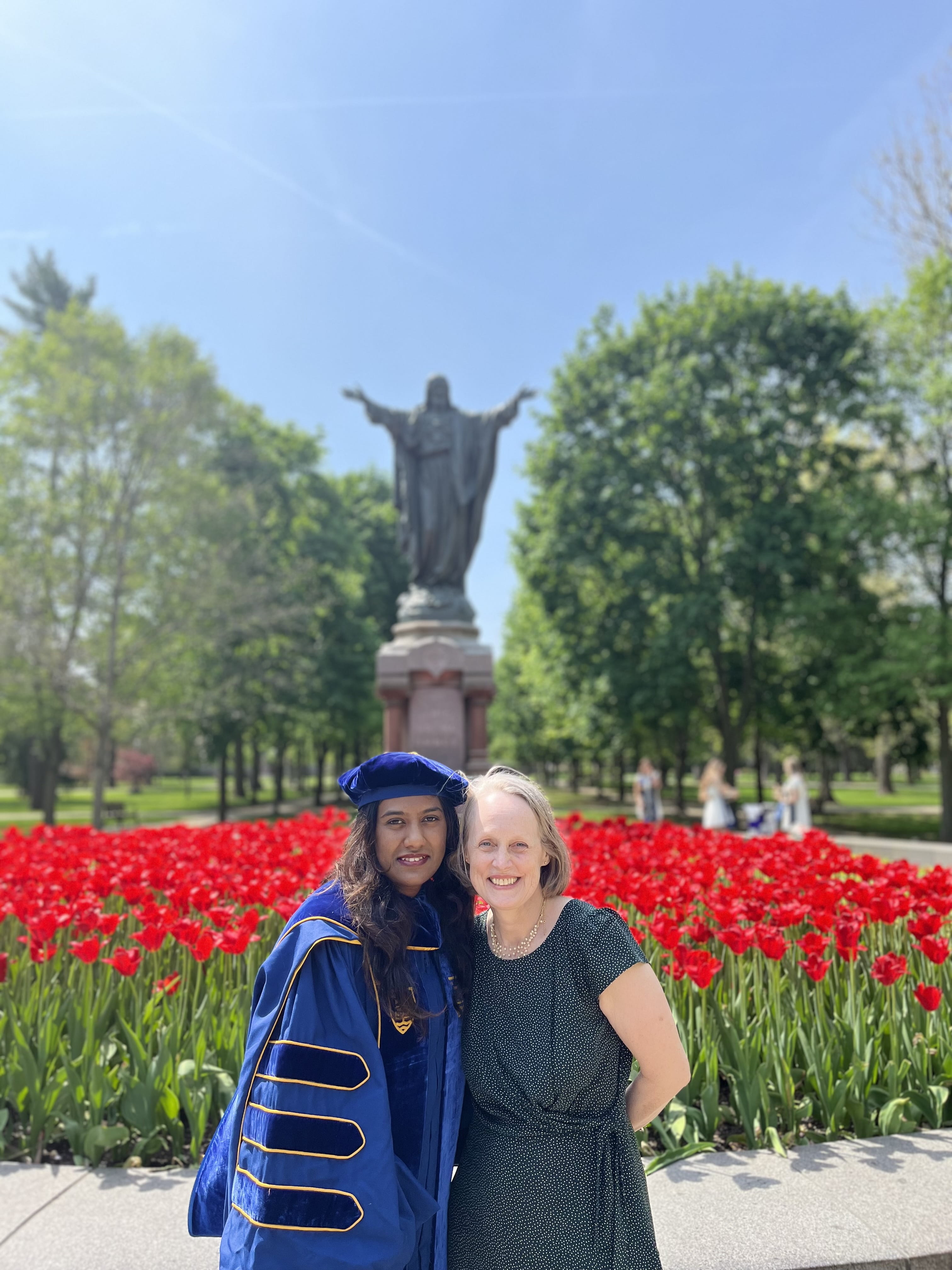 Dushani Ranasinghe, left, and Margaret Schwarz at Ranasinghe's graduation ceremony.