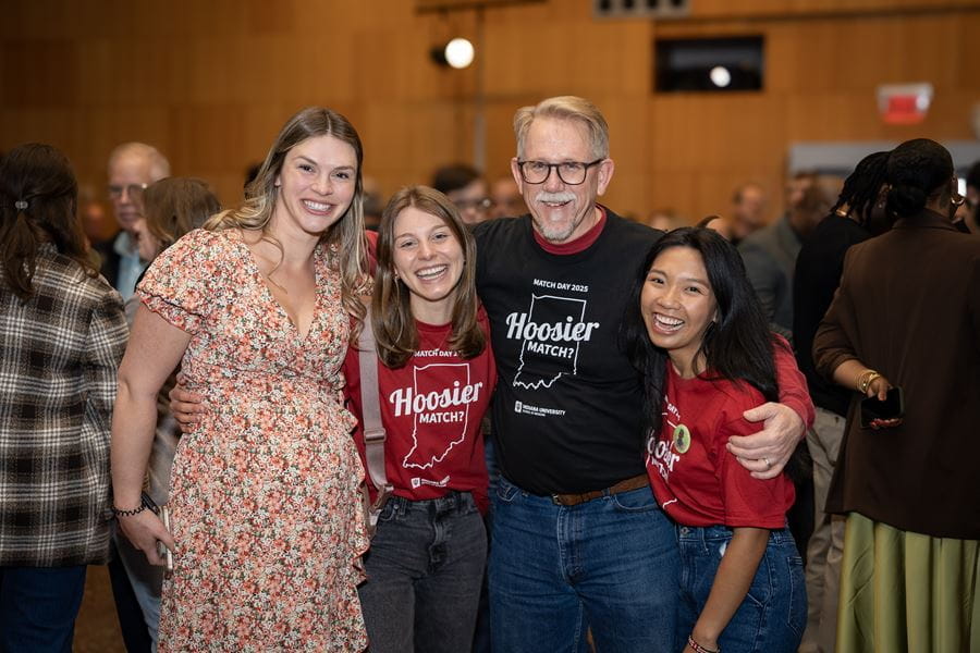 Bradley Allen poses with a group of students at Match Day 2025
