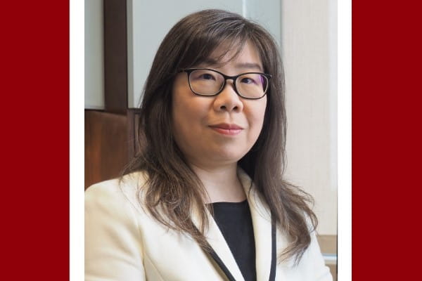 A headshot of a seated woman. 