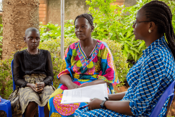 A woman and child are photographed in Africa. 
