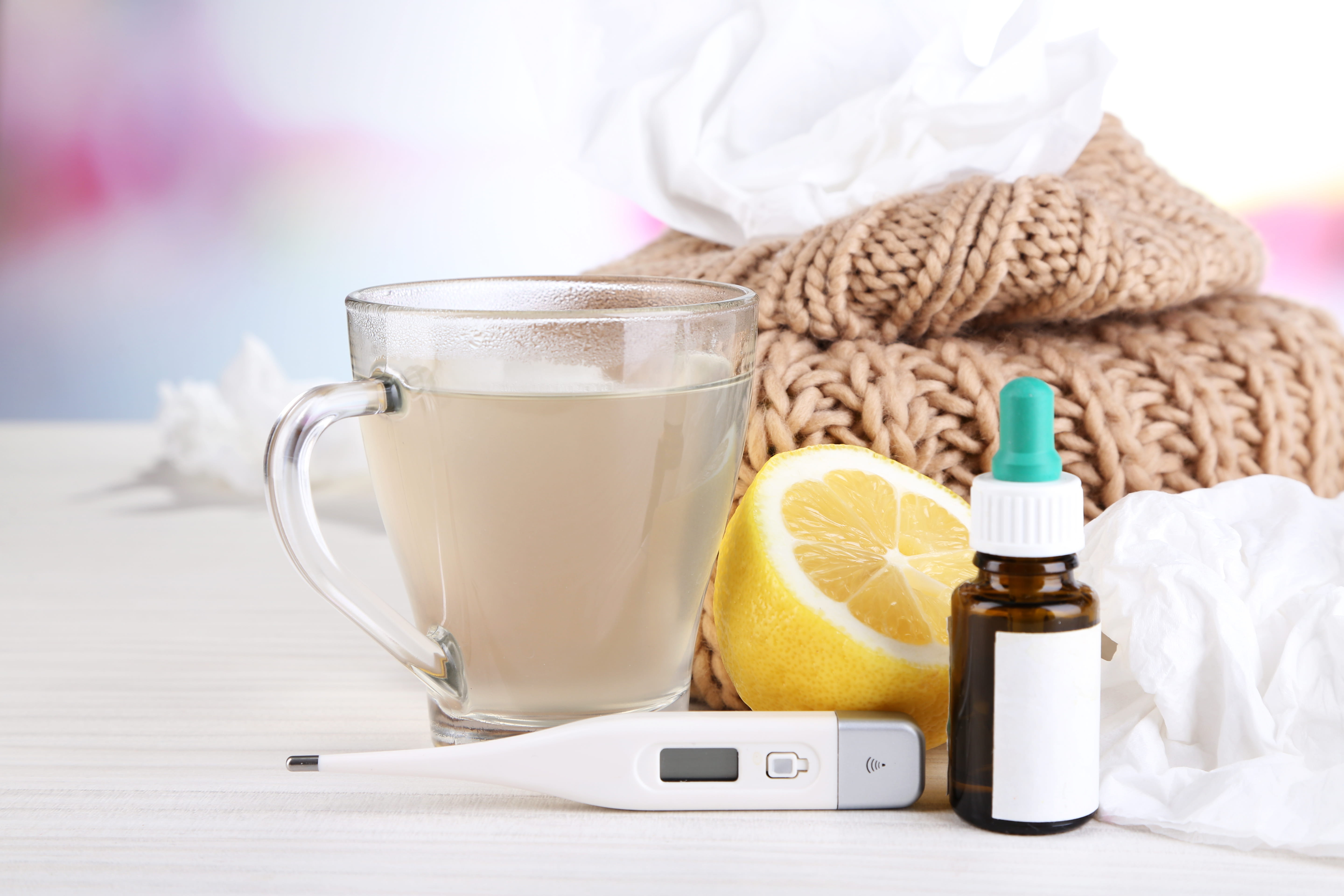 tea, thermometer, lemon, medicine, scarf and tissue 