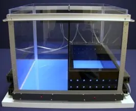 A silver and glass box instrument