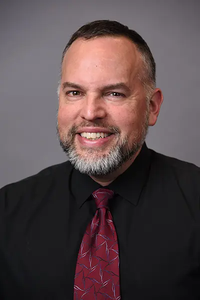 An image of Gabe Rios, Director of the Ruth Lilly Medical Library.