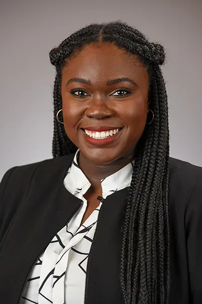 Jenifer Akinduro smiles for her headshot