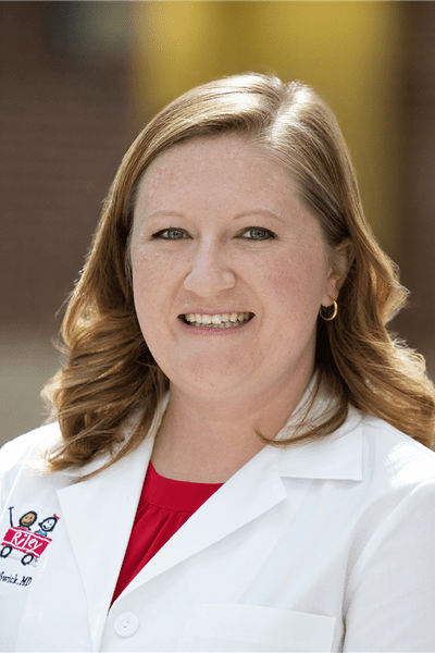 Alyssa Swick, MD headshot Headshot of Alyssa Swick, MD in her white coat with a Riley Logo. | Photo courtesy Alyssa Swick
