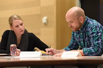 Scientific Writing staff helping a student