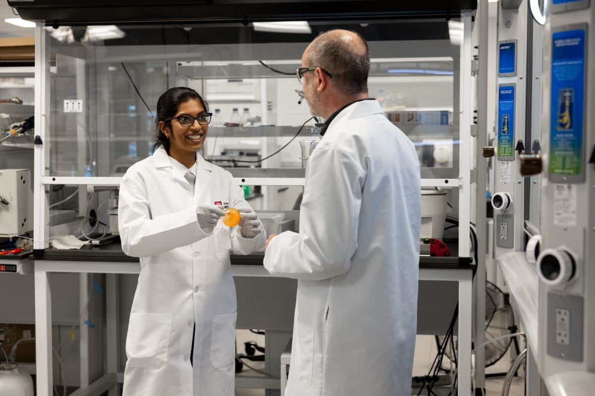 Chemists in laboratory