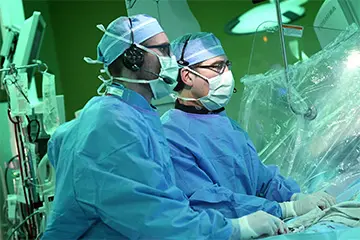 HPB faculty performing surgery in OR