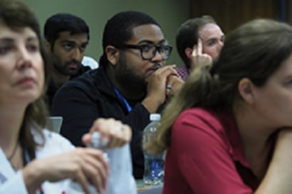 residents sit in a classroom during a didactics sessions