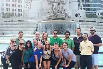 Residents gathered in front of fountain