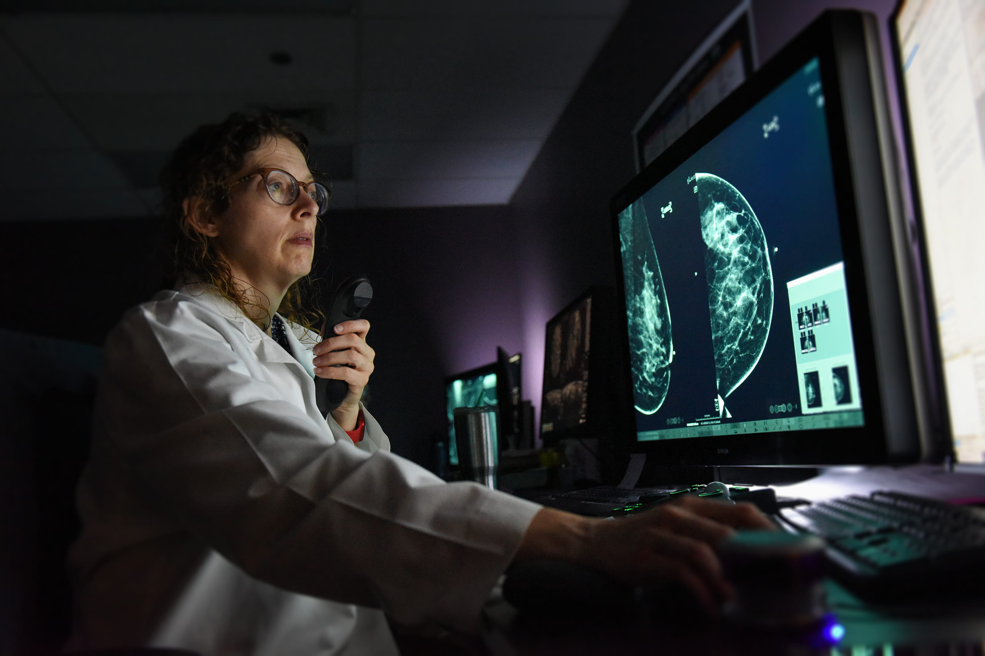Stephanie Holz, MD, annotates a breast scan.