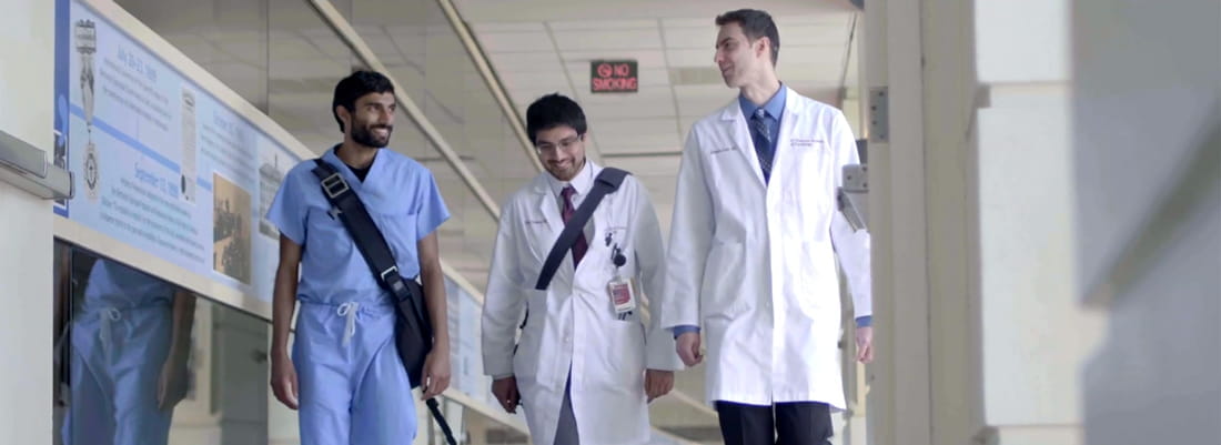 cardiology fellows walk through the hospital