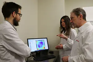 staff scientists review and discuss data in the behavioral phenotype core