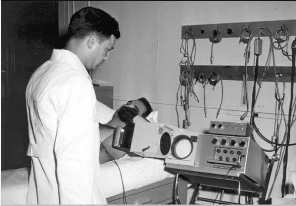 Dr. Feigenbaum performing an early echocardiogram.