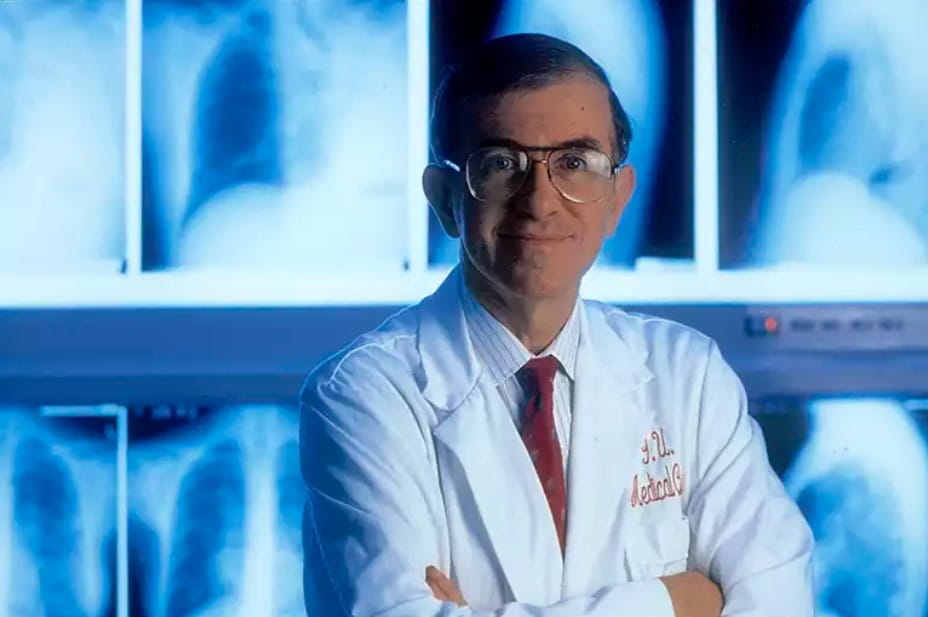 larry einhorn as a young man in front of patient scans