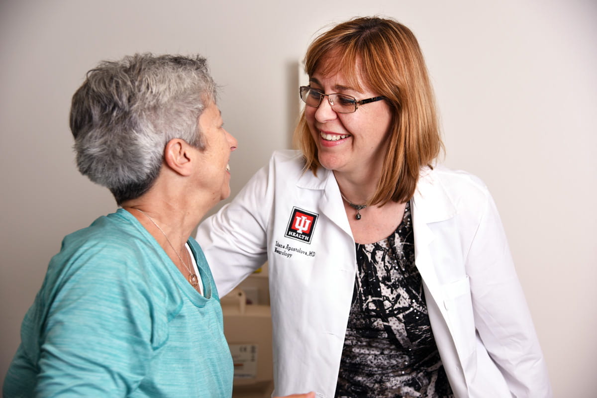 Liana Apostolova with a patient from her research study