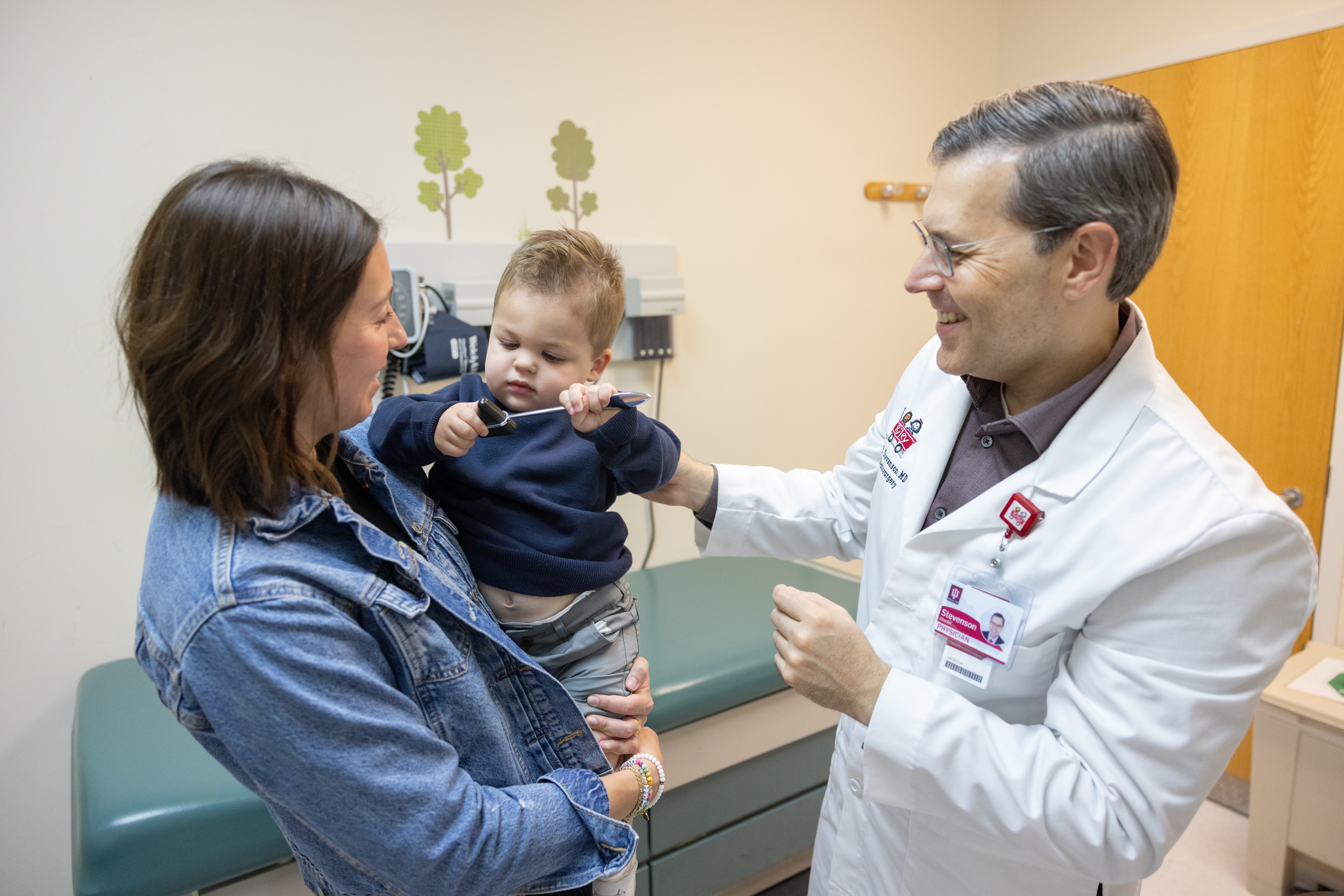 Dr. Charles Stevenson and patients in the clinic