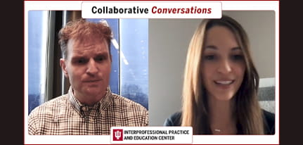 IU IPE's Alex Buchanan sits infront of blue tented windows while interviewing Samatha Mitchell