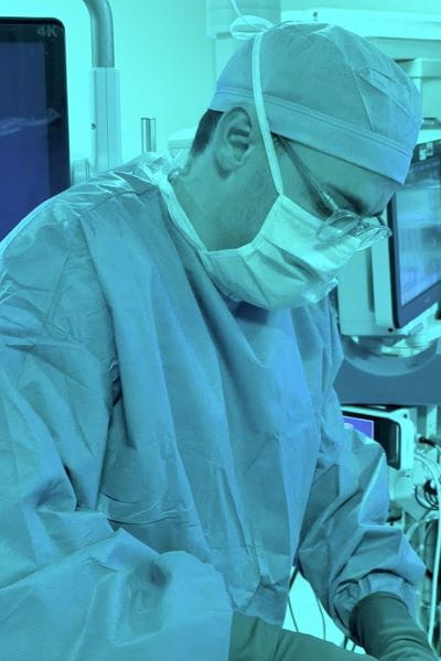 Fellow, Sean McGuire in the operating room. | Photo courtesy of Amy Holmstrom