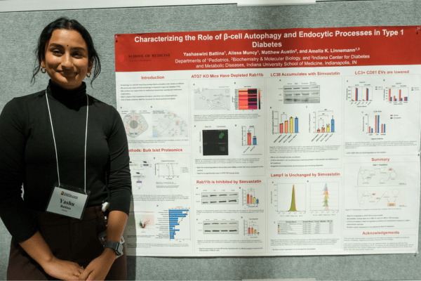 Battina presenting at 2025 Wells Center Retreat